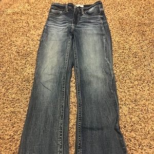 Buckle -boot cut jeans. High rise universal fit.